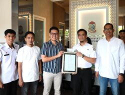 Kadis DPMPTSP Makassar Serahkan PBG